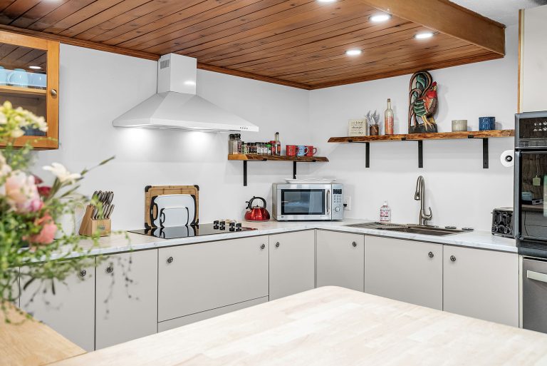 corner view of kitchen featuring stovetop